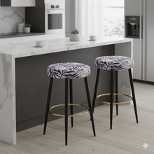 2-Piece Modern Round Counter Stools – 25” Height with Gold Footrest, Upholstered Leaf Pattern Seat, Black Metal Legs – Bar Stools for Kitchen Island, Dining Room, or Home Bar
