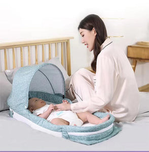 Baby Trace Portable Foldable Infant Bed Sleeper with Waterproof Foam Mattress and Music Box